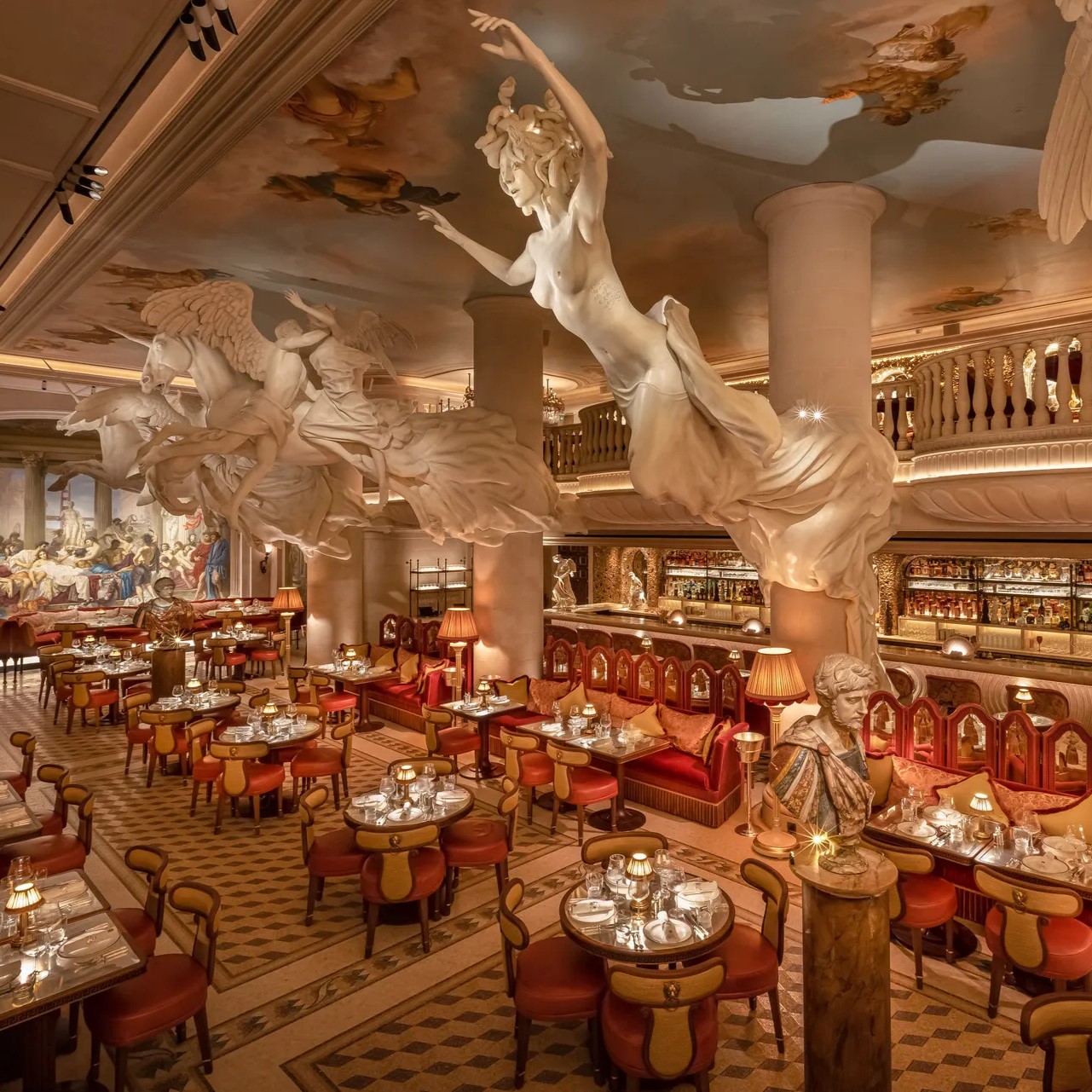 Fancy restaurant with mythological statue on the ceiling