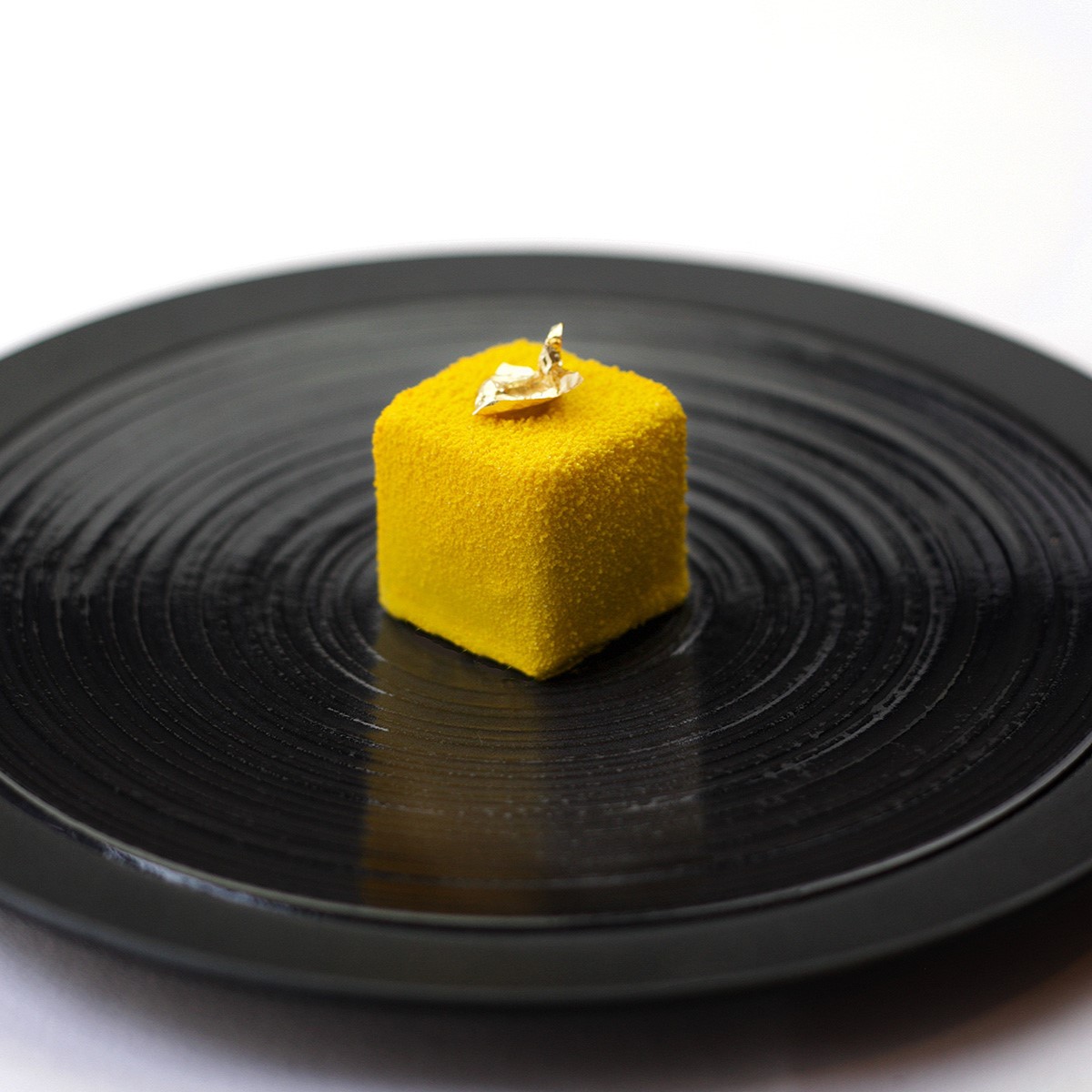 An orange square dessert